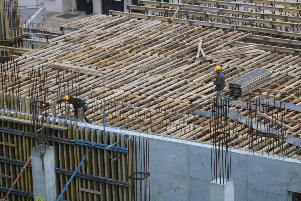 The Case Against Tie Beams in Two-Storey Buildings: Guaranteed Structural Efficiency